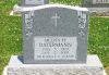 Melvin_Ratermann_tombstone_-_St__Dominics_Cemetery.jpg