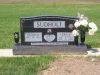 Thomas_and_Leola_Sudholt_tombstone_-_St__Dominics_Cemetery.jpg